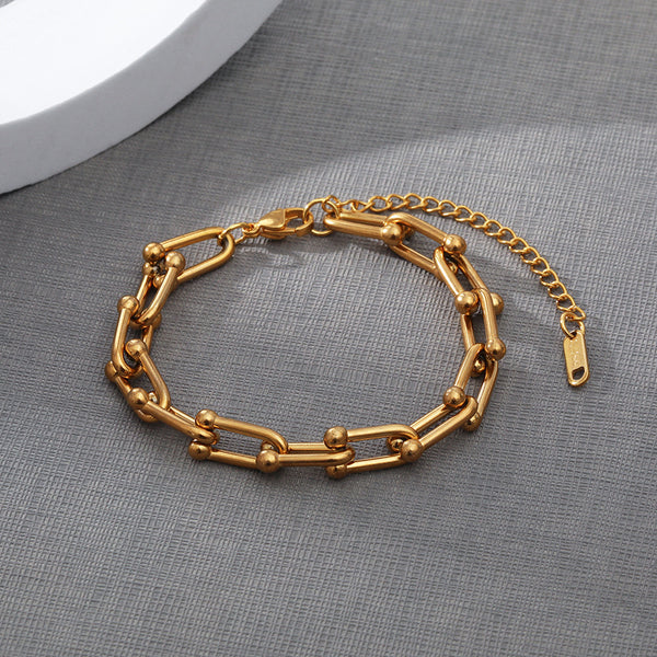 |  Gold-Plated Chain Bracelet | Stainless Steel Gold Link Bracelet | Edgy Gold Chain Bracelet |
Sleek Gold Chain Bracelet | Modern Gold Link Bracelet | Chic Stainless Steel Bracelet |
Statement Gold Chain | Robust Gold Chain Bracelet | Trendy Gold Steel Bracelet  |
Contemporary Gold Chain |